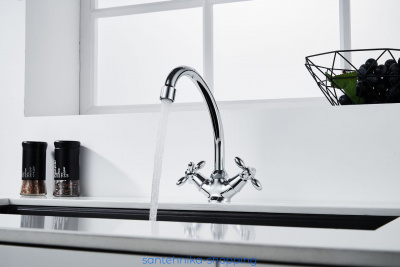 Смеситель DECOROOM DR53012 двуручный  для умывальника с поворотным изливом
